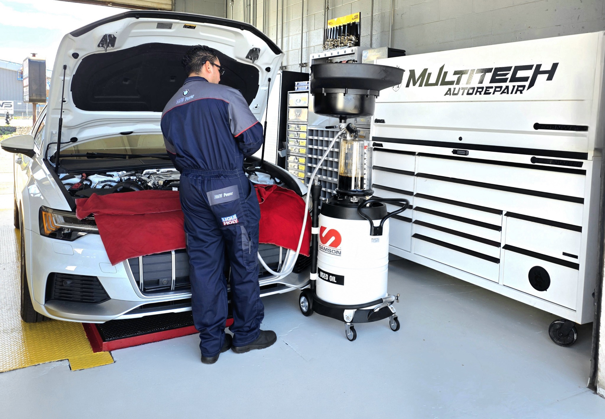Technician servicing an Audi at Multi Tech Auto in Fairfield